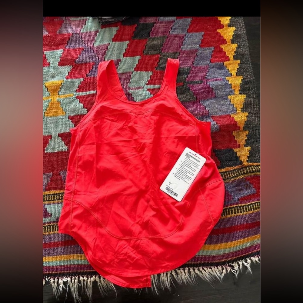 Lululemon run featherweight tie back tank size 2 coral red color